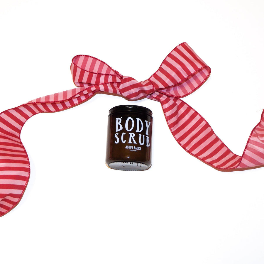 Body Scrub container with a red and white striped bow on a white background